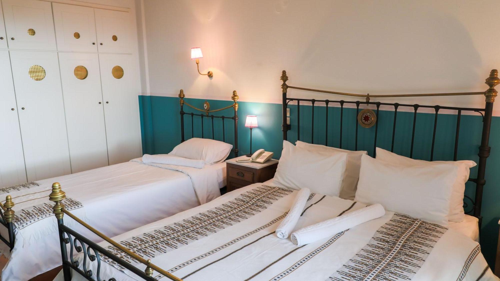 Hotel Papanikola Piána Rum bild
